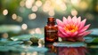 © VirtualVista - Aromatic essential oil bottle with pink lotus flower on water surface surrounded by green lily pads and blurred bokeh background Copy Space