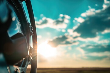 Sticker - A view of sunlight streaming in through the window of a moving vehicle