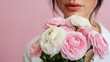 © Ice Cream Paradise - A close-up of a woman holding a bouquet of pink and white flowers against a soft pink background. The woman's face is partially visible, with her lips slightly parted and her gaze directed downwards