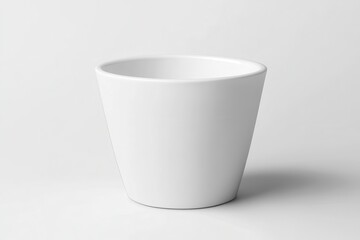 Poster - A Simple White Ceramic Planter Pot on White Background