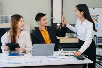 Asian business people working as a good team in the office. Successful teamwork in a meeting, workplace concept.