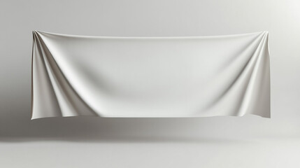 Poster - White fabric draped against a neutral background for artistic display