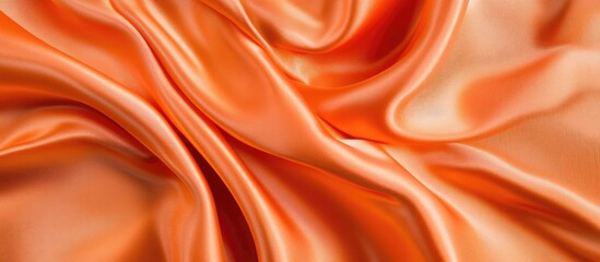 Poster - elegant flowing orange silk fabric in motion showcasing a smooth texture with empty space for text o