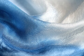 Poster - Elegant Blue and Silver Fabric Texture Soft Drape Shimmering Waves Gentle Flowing Material Background