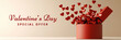© Abdul Qaiyoom - Valentine's Day Sale Banner with Red Hearts Coming Out of Box on Pastel Brown Background.