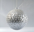 © Aliimran - A Silver disco ball hanging on white background