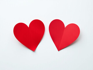 Aufkleber - Two Red Heart Shapes Are Placed Against A Clean White Background Creating A Simple Yet Elegant Design. 00002