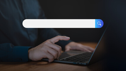 Poster - Adult man using a laptop searching on the internet. SEO technology networking, representing online browsing, information seeking, and digital search technology in a modern workspace.