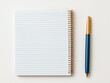 © oksa_studio - Notebook with blue lined pages and a blue and gold pen on a white surface
