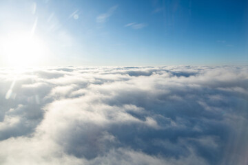 Wall Mural - fluffy white clouds from above