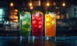© ANUAR - Refreshing Summer Beverages in Vibrant Colors with Ice Cubes and Mint Leaves in a Cozy Bar Setting at Night