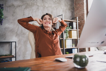 Wall Mural - Photo of pretty young girl stretching sleepy relax done work wear brown silk shirt coworking successful nice light office