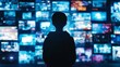 © Marco - man with his back in front of many screens