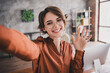 © deagreez - Photo of lovely young lady wave hand hi take selfie photo dressed brown satin shirt startup office room interior
