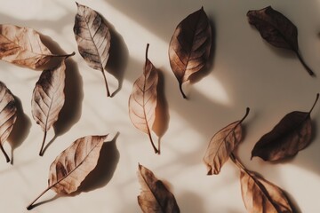 Poster - A collection of dried leaves resting on a tabletop, great for still life or nature-themed compositions