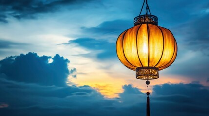 Wall Mural - illuminated asian lantern against sunset sky