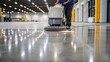 © DigitalSpace - A medium closeup of a worker adjusting a floor scrubber with bright reflections showing the effectiveness of the cleaning process on the polished concrete floor.