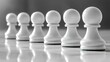 © Bejo - White pawns aligned, strategy game, reflective surface, business concept.