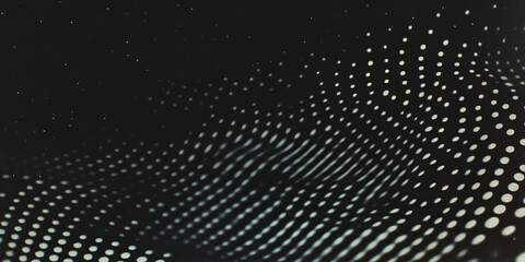 Poster - Grunge halftone texture with dots creating an industrial look on a black background