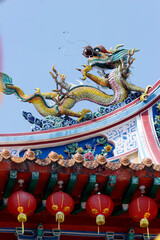 Wall Mural - Chinese Thean Hou Temple dedicated to the goddess Mazu and Guan Yin. Roof decoration with Chinese dragon.  Kuala Lumpur. Malaysia.