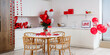 © Pixel-Shot - Interior of festive kitchen with table served for Valentine's Day celebration