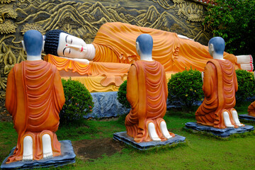 Wall Mural - Thien Truc buddhist pagoda. Reclining Buddha. The final Nirvana. The Buddha entered into meditation, deeper and deeper. And then he passed away.  Bac Lieu. Vietnam. .