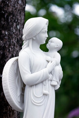 Wall Mural - Basilica of Our Lady of La Vang.  Virgin Mary and child. Asian style.  Marble statue.  Vietnam.