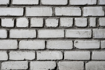 Wall Mural - Texture of grey brick wall as background, closeup