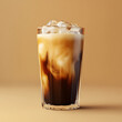 © Woraporn - tall glass of cold brew coffee served over ice, showcasing rich blend of dark and creamy tones. Perfect for refreshing drink on warm day