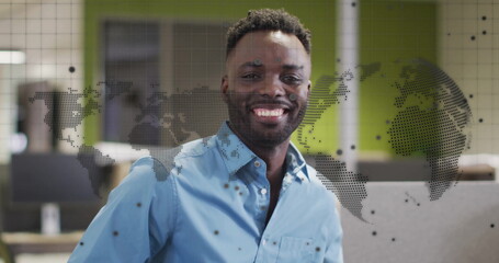Poster - Image of globe and digital data processing over african american businessman in office
