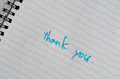 © rai - ノートに書いてある手書きの「thank you」