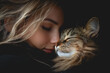 © Chalita - Cuddling woman and cat in cozy indoor setting emotional bond pet love and affection relaxing together cozy atmosphere feline companion warm embrace and bonding moments