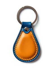 Wall Mural - Blue orange leather raindrop shape keychain isolated on white background