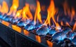 © Sergey Fedchenko - A contemporary glass-front fireplace with blue and orange flames dancing over ceramic logs, in a detailed close-up