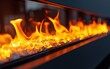 © Антон Федченко - A modern electric fireplace with glowing orange flames and a sleek black frame, captured up close