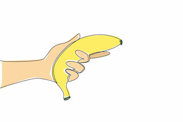 Poster - single continuous line drawing hand holding a banana. fruit with yellow skin and many types. has a d