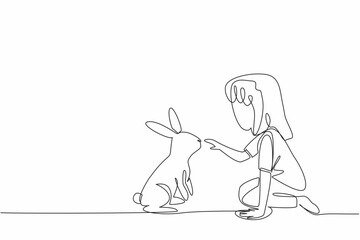 Wall Mural - Continuous one line drawing girl sit cross legged and playing with rabbit. Relieve fatigue from studying by playing with rabbit. National Kids and Pets Day. Single line draw design vector illustration