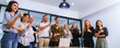 © kanpisut - Diverse colleagues gather in brainstorm discuss statistics together. Group of people colleagues gather doing Brainstorming business plan together. Team Brainstorm Working Concept. people meeting