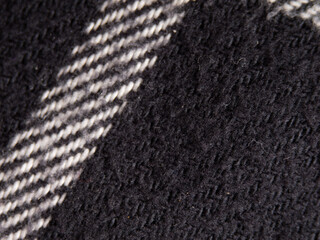 Poster - A close up of a black and white striped fabric
