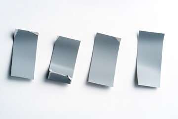 Poster - A collection of papers sitting on a flat surface, possibly awaiting organization or analysis