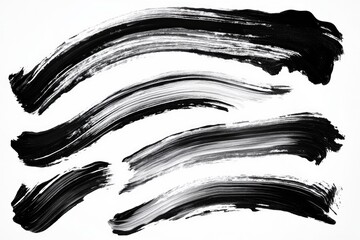 Poster - A close-up of a set of black brush strokes on a white background, ideal for art and design projects