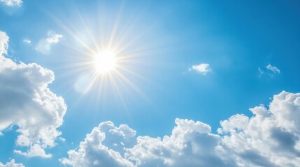 Wall Mural - the bright sun illuminates fluffy clouds while casting a warm glow on the tranquil sky during midday