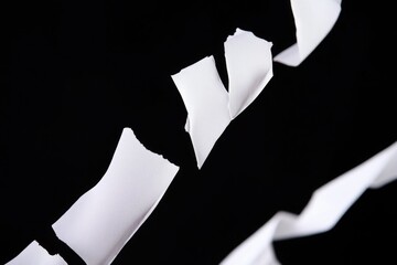 Aufkleber - A close-up of torn pieces of paper in shades of gray