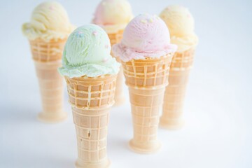 Poster - A colorful display of stacked ice cream cones, perfect for advertising or illustration