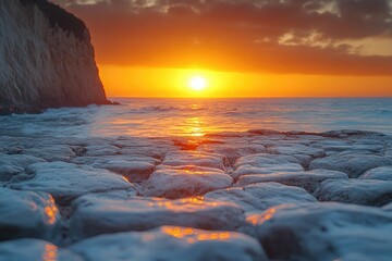 Poster - A serene sunset scene on a rocky beach