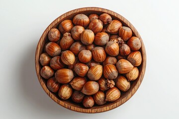 Aufkleber - A wooden bowl filled with nuts sits on a clean white table, ready for snacking