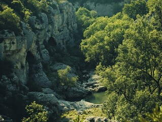 Wall Mural - A serene landscape featuring rocky cliffs, lush green trees, and a tranquil body of water