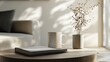 © Zara - A mug and a book placed on a modern side table with natural light