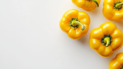 Poster - Fresh yellow pepper displayed on a white background, perfect for showcasing vibrant color and freshness. This fresh yellow pepper adds a lively touch and enhances visual appeal with copy space.