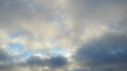 Poster - Observe dynamic flow of clouds against a vibrant blue sky, real time capture. Experience gradual shifts in skyscape during different moments in the day. Weather forecast. Climate change. Slow motion.